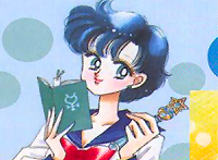 Ami holding a book and her henshin pen.
