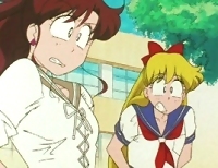 Makoto and Minako look extremely shocked and embarrassed.