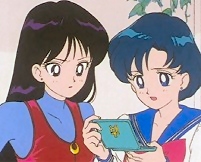 Rei and Ami worriedly examine Ami's supercomputer.